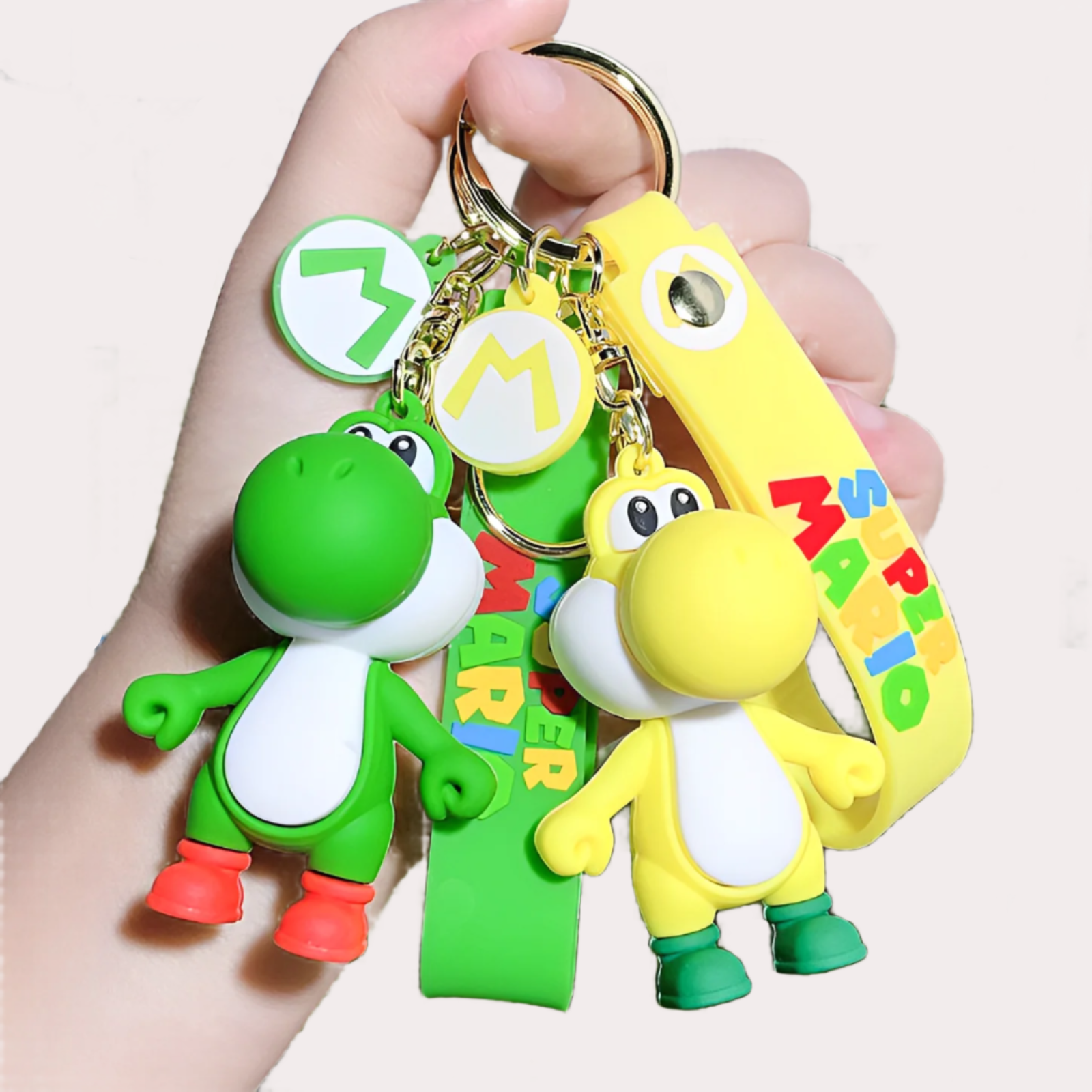 Yoshi keychain in hand